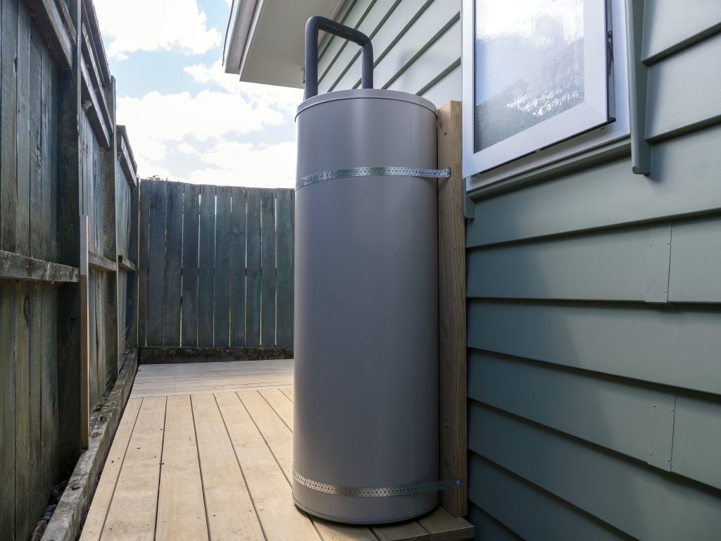 Development and commercialisation of a novel domestic heat pump water heater (SolaTank) 